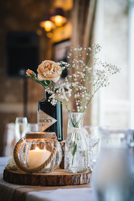 rustic wedding centrepiece gin theme